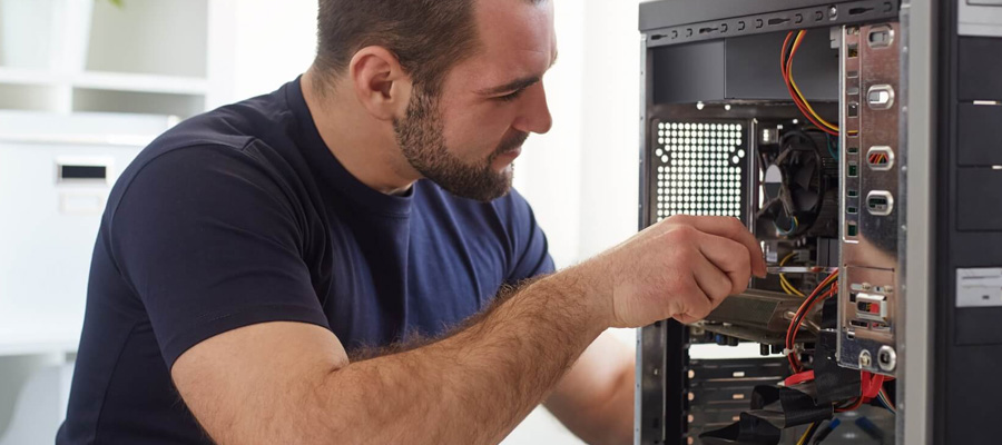 repair agent working on computer